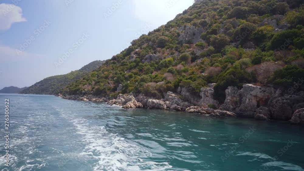 View from boat. The boat is floating near the shore. View from boat. The boat is floating near the shore.