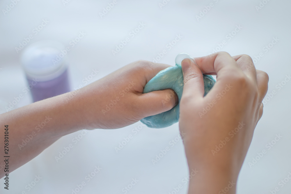 slimes in the hand of a child slimes in the hand of a child