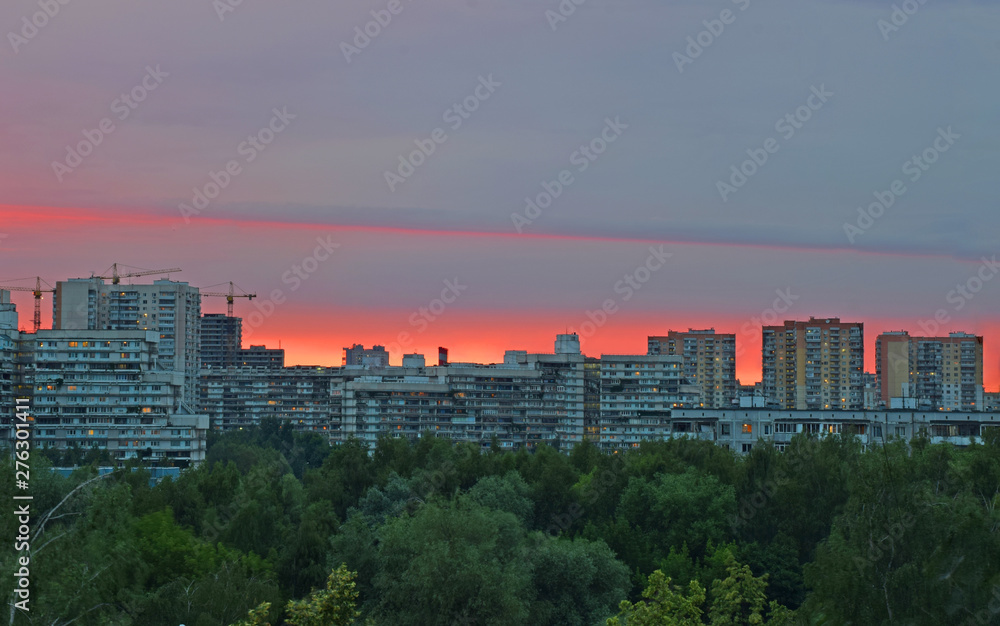 The process of sunset over the city. Russia, Moscow, June 2019.