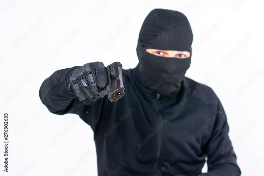 Gunman about to shoot with a gun Gunman about to shoot with a gun