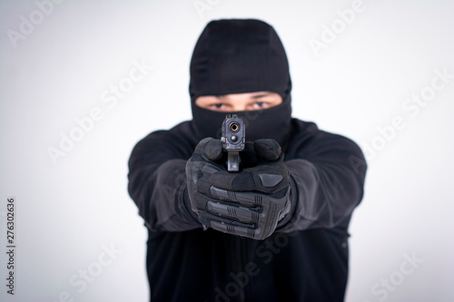 Gunman about to shoot with a gun