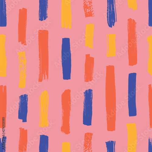 Abstract seamless pattern with colorful vertical stripes on pink background