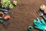 Top view of gardening tools on the ground