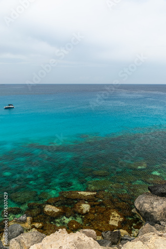 CYPRUS, CAPE CAVO GRECO - MAY 11/2018: Tourists sailed on a motor boat into the blue lagoon for swimming.