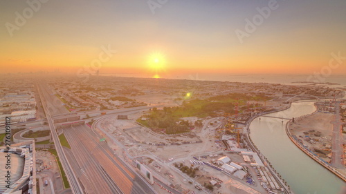 Panorama and aerial view of coastline Dubai at sunset timelapse, United Arab Emirates