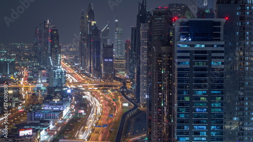 Aerial view to skyscrapers on Dubai downtown and Sheikh Zayed road night timelapse, Dubai, United Arab Emirates