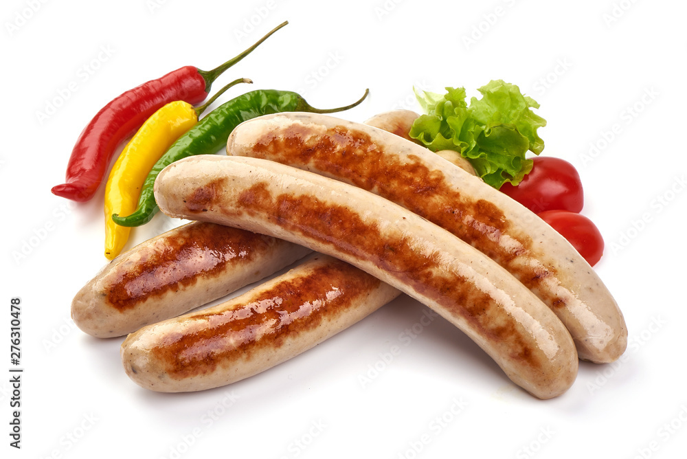 Grilled German pork sausages, Thuringer Rostbratwurst, close-up, isolated on white background Grilled German pork sausages, Thuringer Rostbratwurst, close-up, isolated on white background