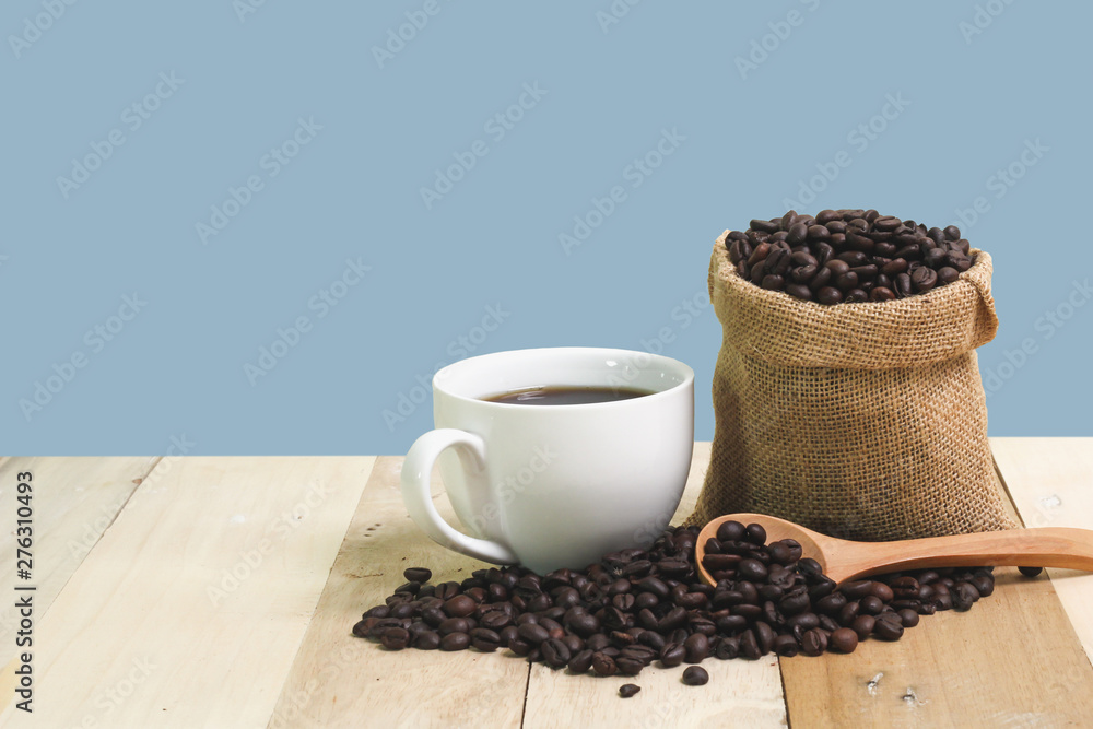 Hot Coffee cup on the wooden table Hot Coffee cup on the wooden table