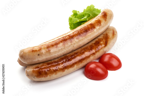 Grilled German pork sausages, Thuringer Rostbratwurst, close-up, isolated on white background photo