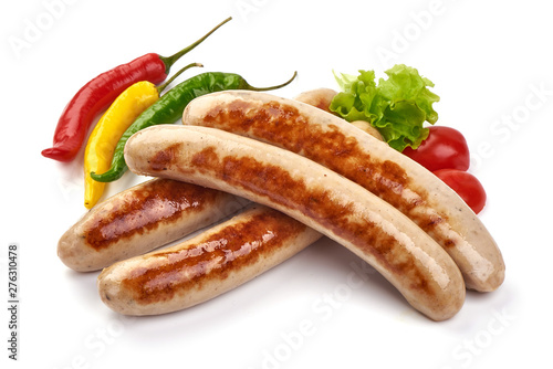 Grilled German pork sausages, Thuringer Rostbratwurst, close-up, isolated on white background