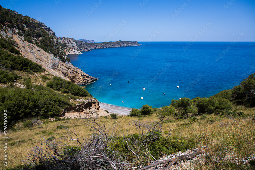 Coll Baix beach in Alcudia bay in Mallorca Balearic islands of Spain. Tropical paradise beach.Summer vacation travel holiday background concept