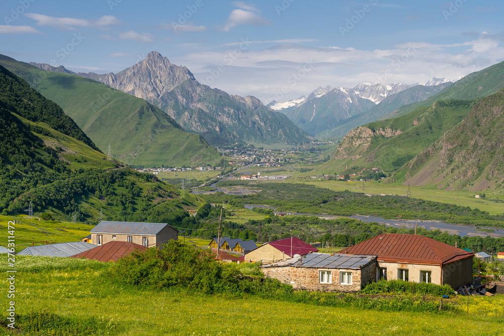 Beautiful scenery of Kazbegi valley in summer season, Caucasus range, Georgia