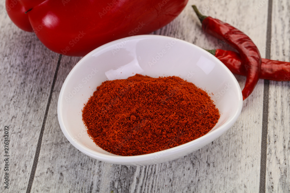Paprika powder in the bowl Paprika powder in the bowl