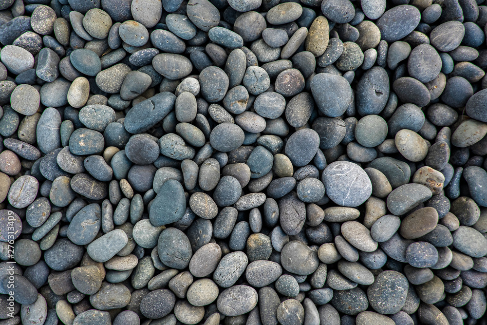 Pebbles stone texture and background. Abstract background made with stones. Pebbles stone texture and background. Abstract background made with stones.