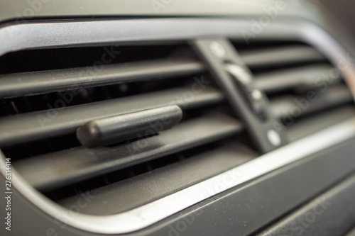 Air conditioner in modern compact car close up © Piman Khrutmuang