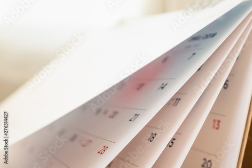 Abstract blur calendar page flipping sheet close up background