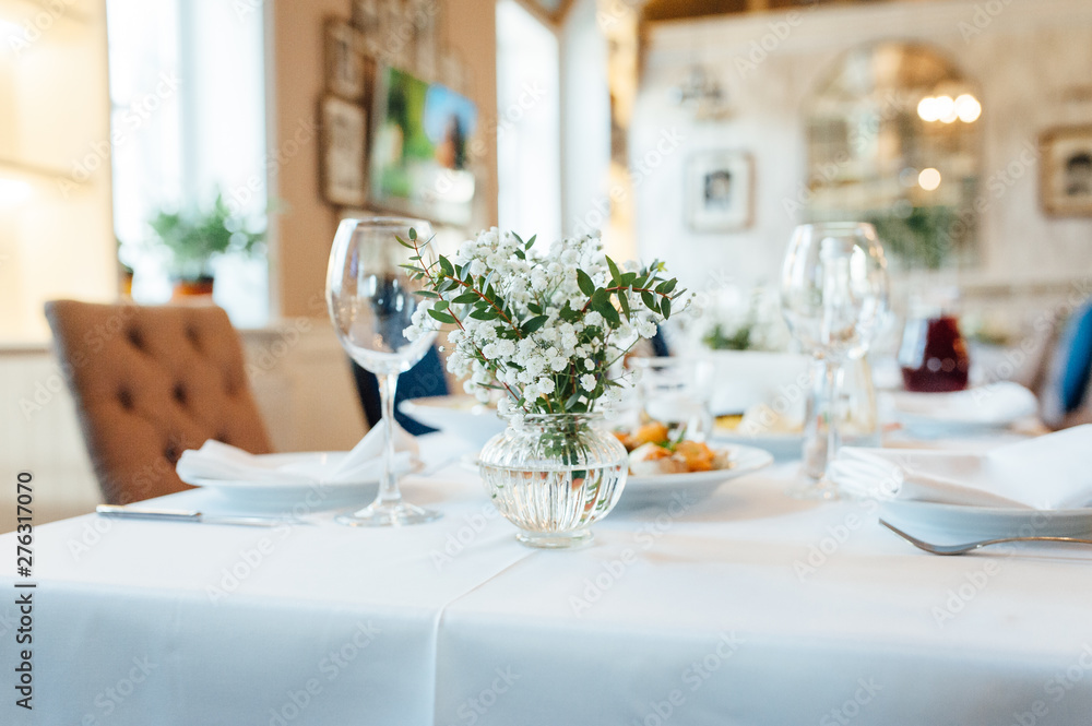 Festive wedding table setting. Empty wine glasses