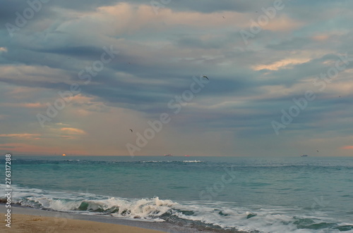 cirrus clouds over the sea at sunset. romantic seascape sunset in pastel colors. pastel sunset sky with cloudscape over the Black sea