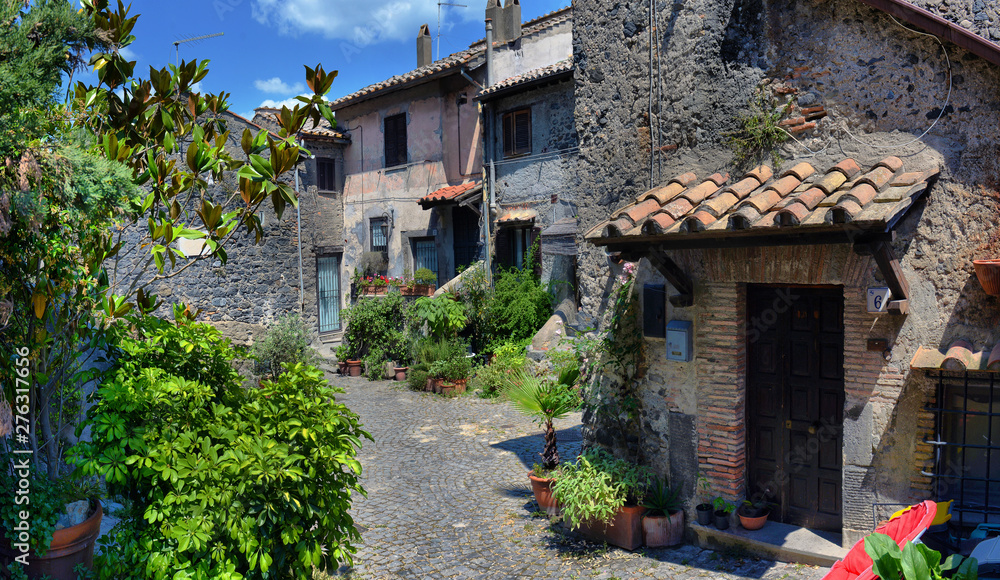 Fototapeta premium Italy, Anguillara Sabazia - January 31 2016: Anguillara is a small medieval town overlooking Bracciano Lake