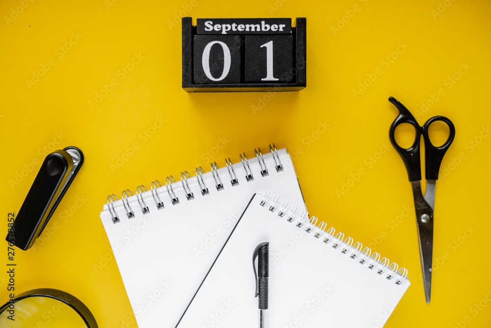 Back to school colorfull flatlay. Pencils notepad alarm clockclips and pen holder. Back to school colorfull flatlay. Pencils notepad alarm clockclips and pen holder.