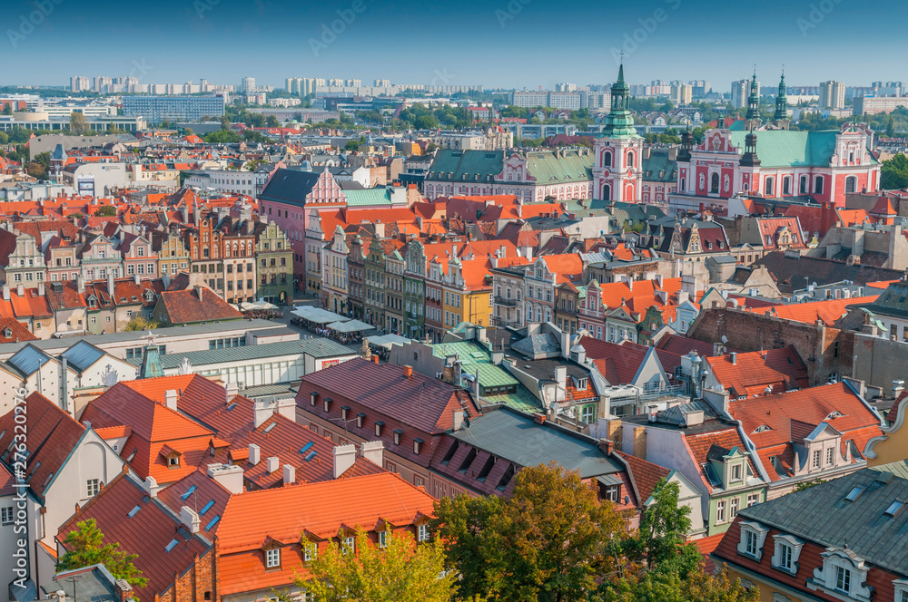 View from Castle tower on old town buildings and collegiate church in center of polish city Poznan, Poland.
