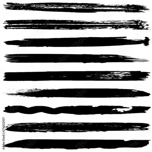 Grunge brush vector. Abstract black spots on white background.
