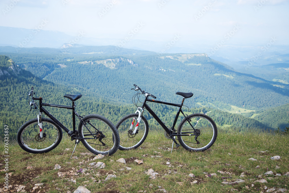 Two bicycles on mountain