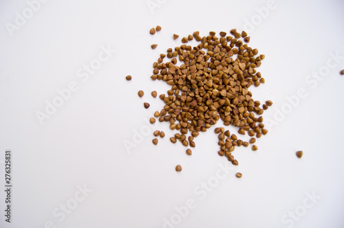 pile of flax seeds isolated on white background