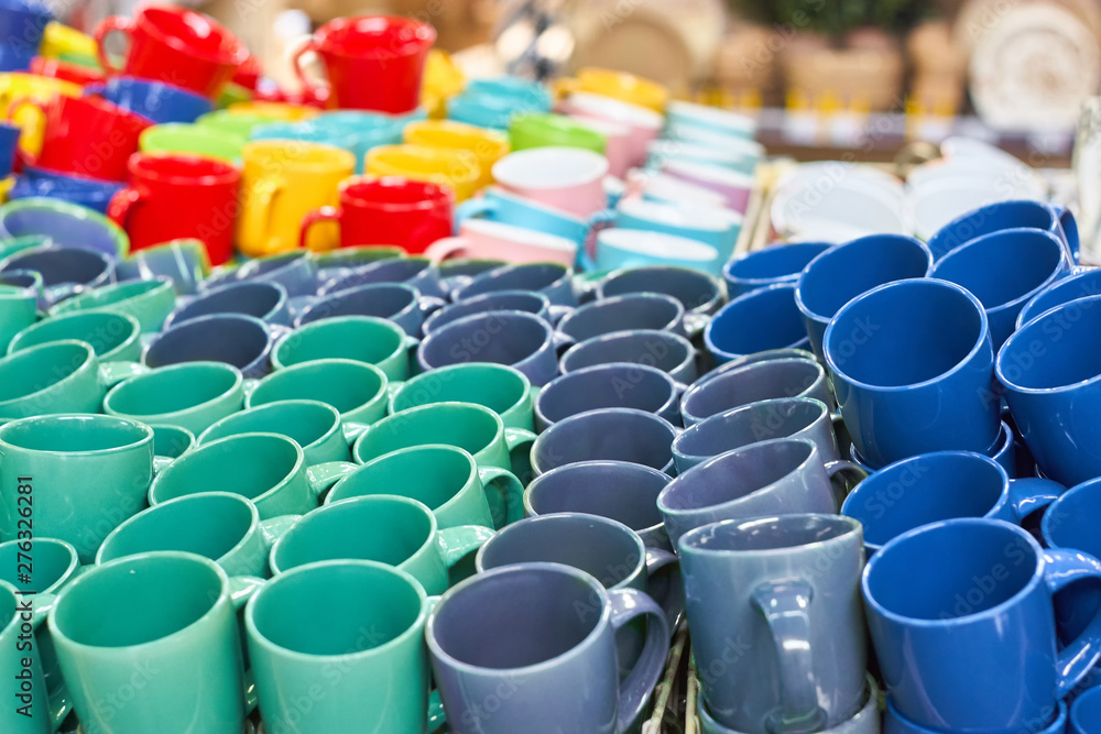 Many colorful empty ceramic cups. Many colorful empty ceramic cups.