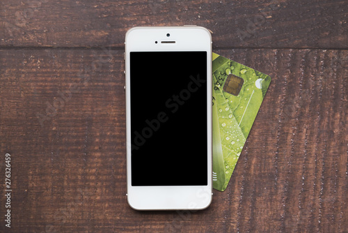 Top view smartphone with credit card