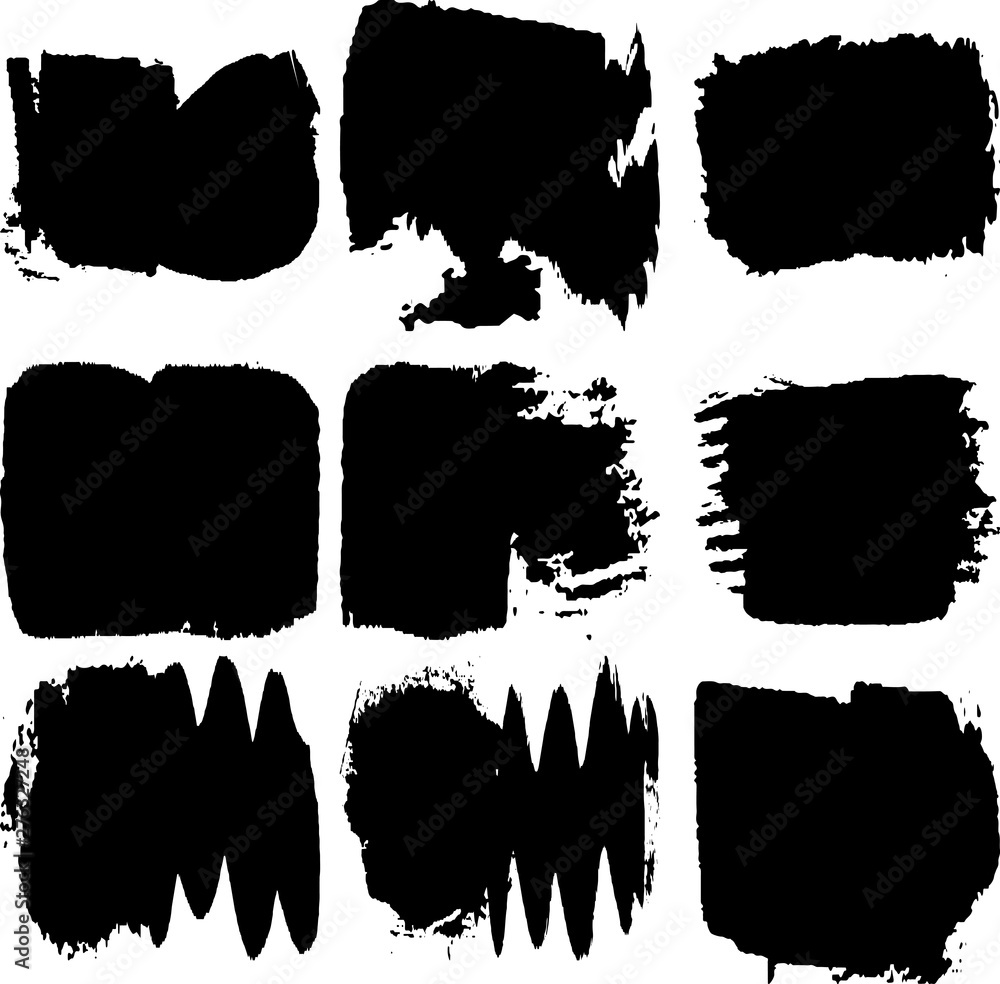 Set of grunge spots black on white background.