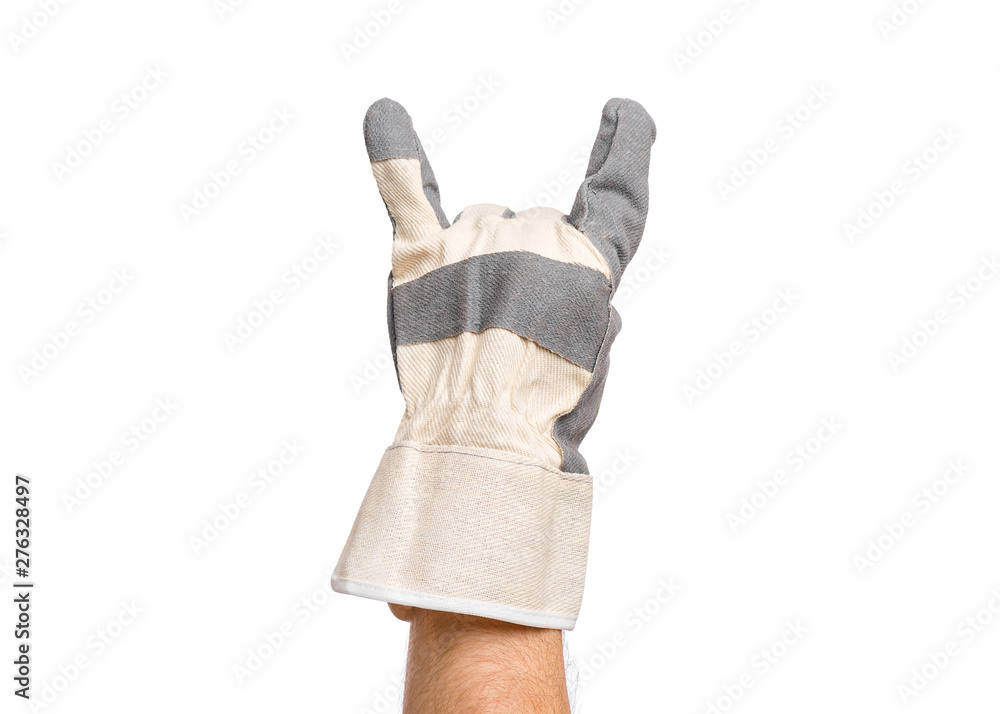 Worker showing gesture - rock and roll sign. Male hand wearing working glove, isolated on white background. Worker showing gesture - rock and roll sign. Male hand wearing working glove, isolated on white background.