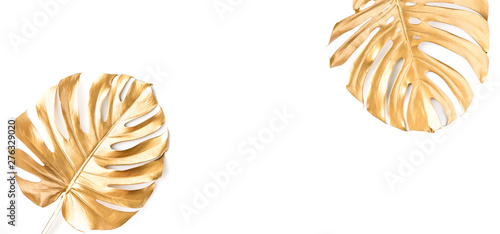Flat lay of golden tropical leaf design elements. Decoration elements for inv...