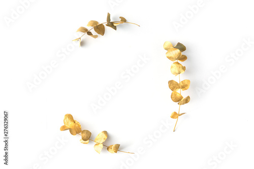 Flat lay of golden tropical leaf design elements. Decoration elements for inv...