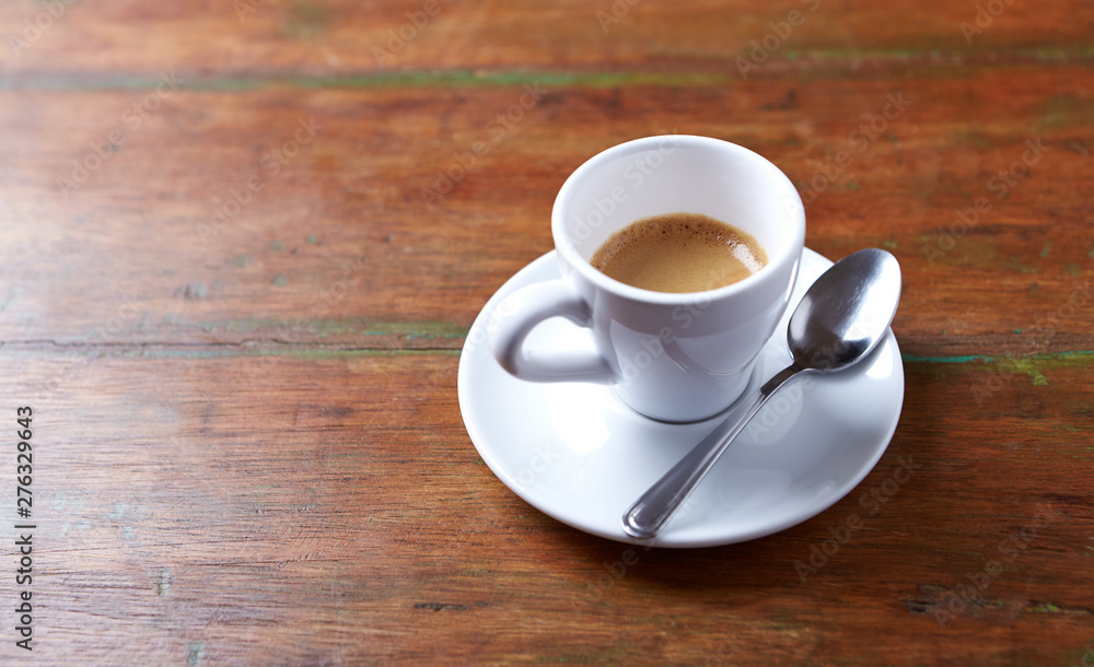 Cup of coffee on rustic wooden background. Copy space. Cup of coffee on rustic wooden background. Copy space.