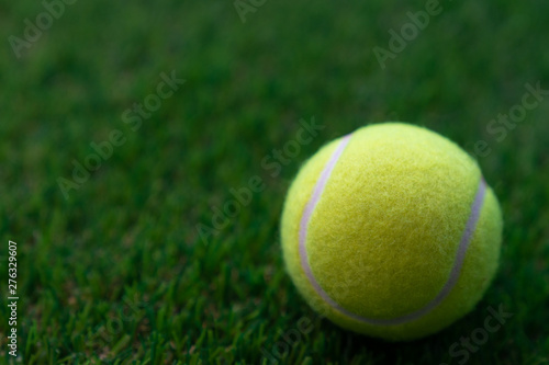 Tennis ball on a green background,Tennis