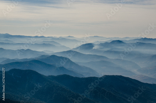 Photography Aerial view of silhouetted  blue mountains