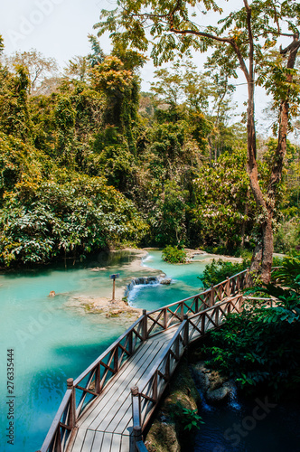 Blue water pond Kuang Si waterfall in Luang Prabang  Laos during summer season.