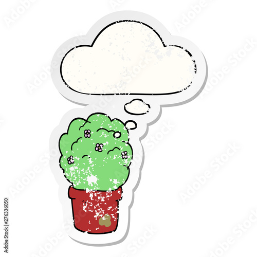 cartoon shrub and thought bubble as a distressed worn sticker