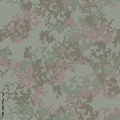 Forest camouflage of various shades of green and brown colors