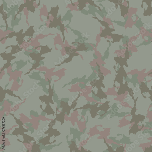Forest camouflage of various shades of green and brown colors