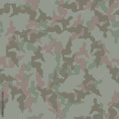 Forest camouflage of various shades of green and brown colors