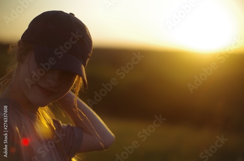  young girl smiling at sunset
