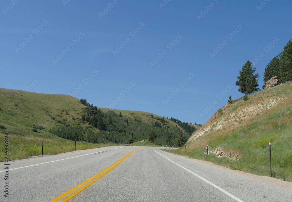 Beautiful landscape along the smooth paved Highway 16, part of the over one million acres of Bighorn National Forest in northern Wyoming.