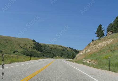 Beautiful landscape along the smooth paved Highway 16, part of the over one million acres of Bighorn National Forest in northern Wyoming.