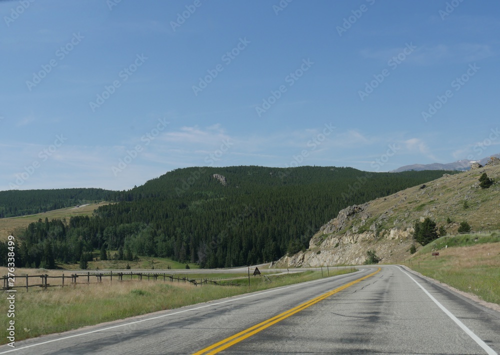 Pleasant drive along Highway 16 at Bighorn National Forest which covers over a million acres in Wyoming.