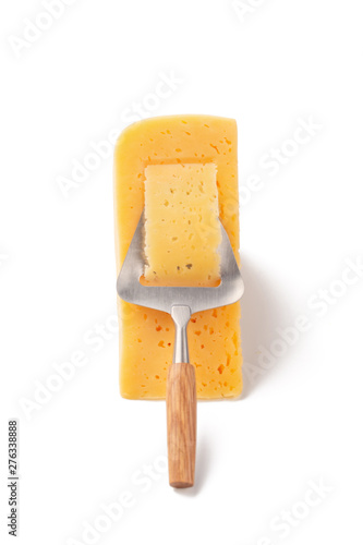 Dutch cheese with typical slicer isolated over white