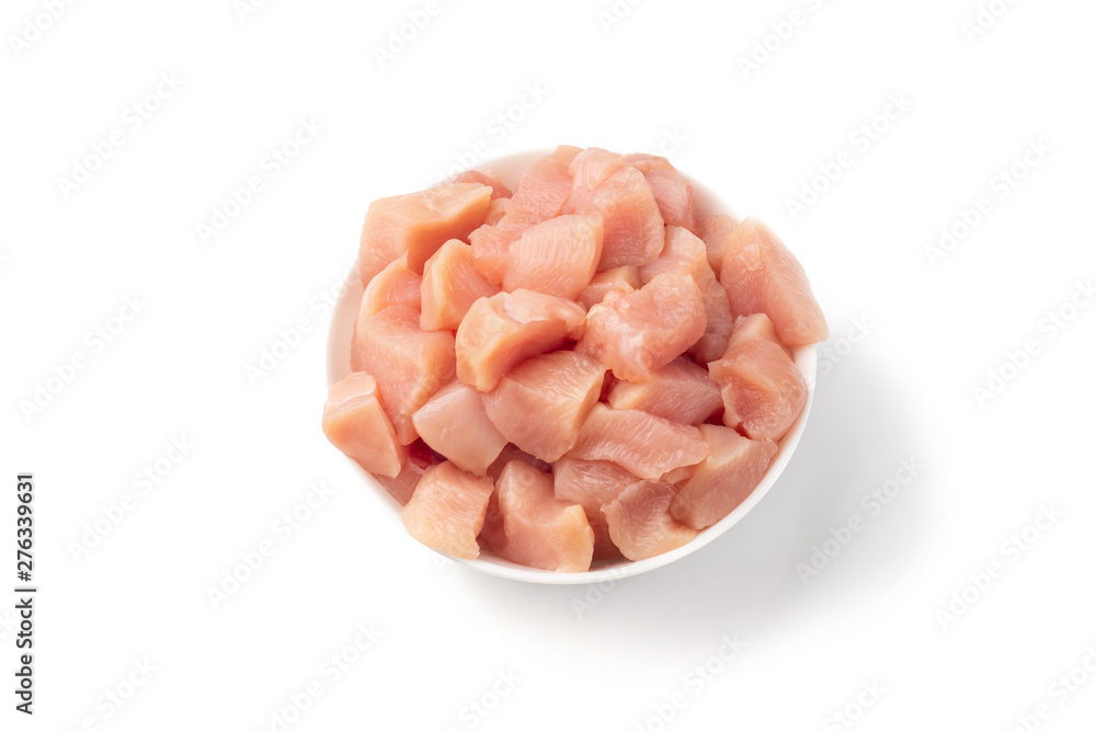 Raw chicken fillet chunks isolated on white Raw chicken fillet chunks isolated on white