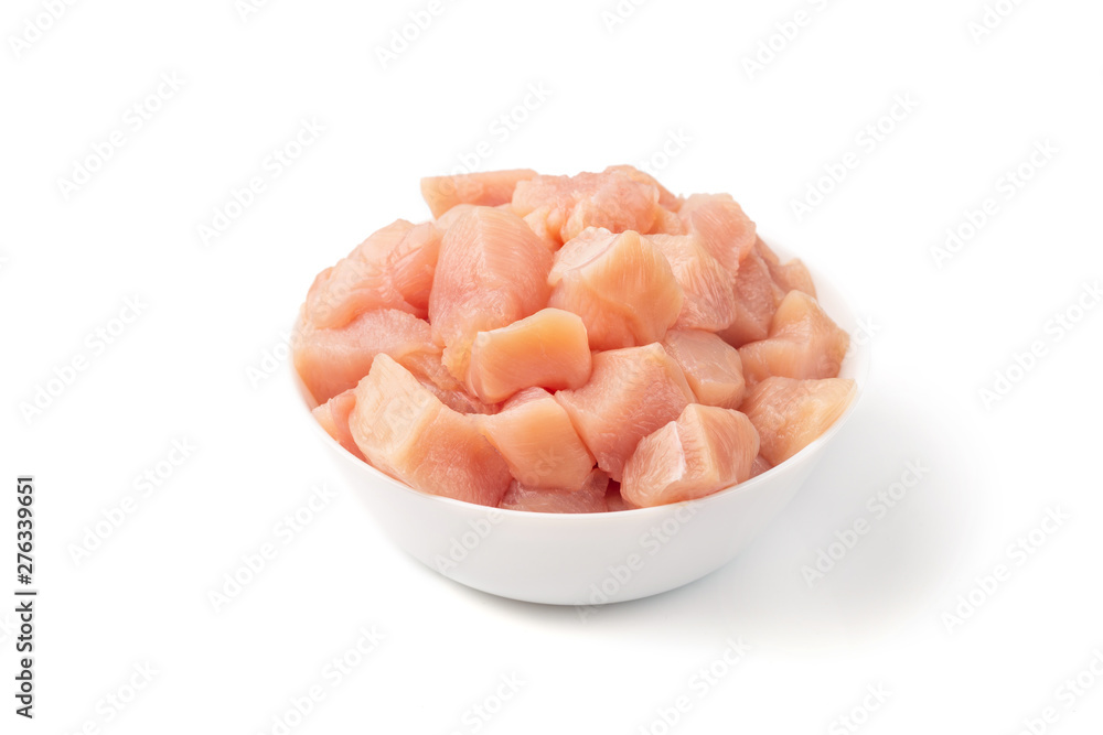 Raw chicken fillet chunks isolated on white Raw chicken fillet chunks isolated on white