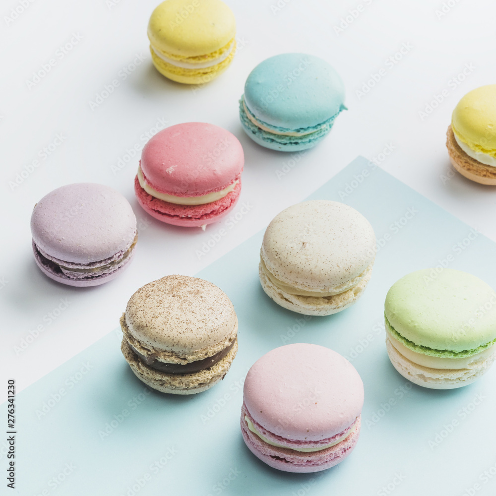 Many colorful macaroons on dual backdrop Many colorful macaroons on dual backdrop